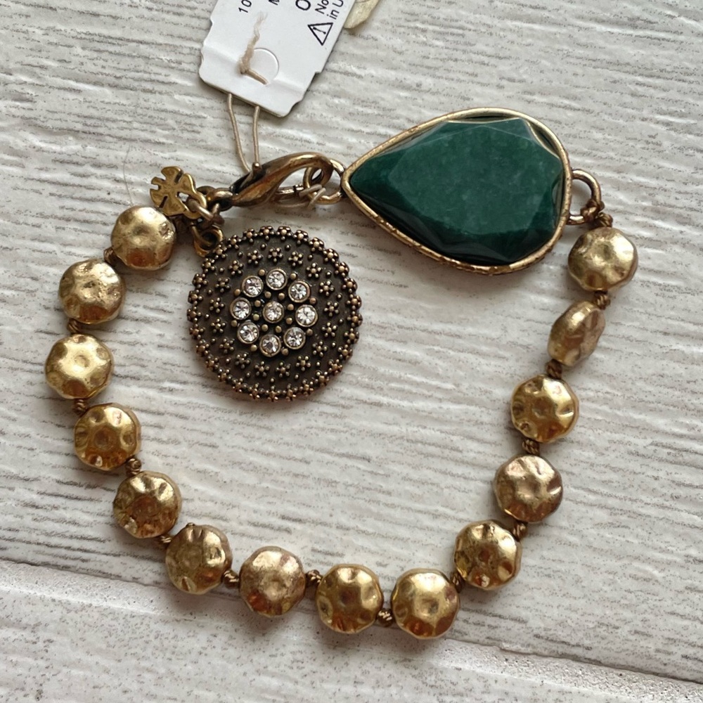 Fossil Gold and Green Bracelet with Heart Design